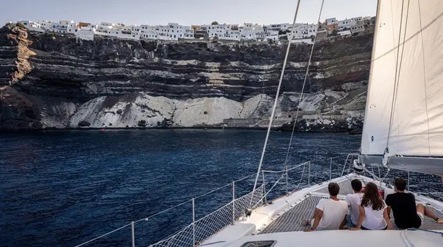 Catamaran vs Sailing Boat in Santorini's Caldera