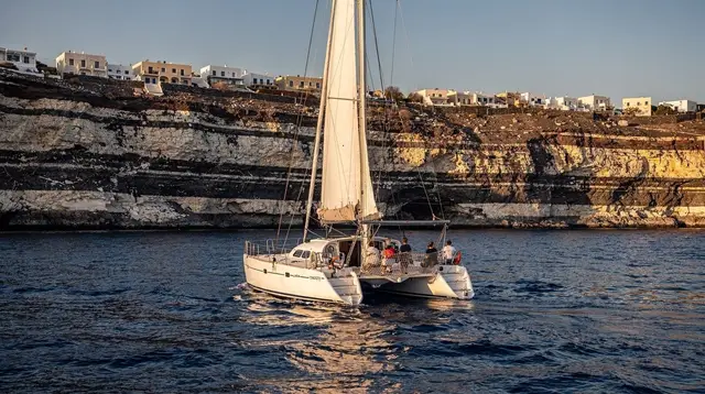 Catamaran vs Sailing Boat in Santorini's Caldera